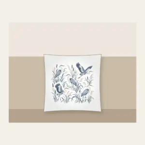 Herons and Reeds in Grey-Blue Pillow in white: Herons stand among reeds in grey-blue and cream in an all-over pattern.
