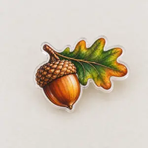 Tiny Acorn Pin with a single acorn with an oak leaf in warm brown and green with a thin gold outline