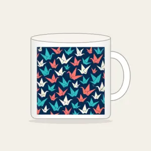 Origami Cranes on Navy Mug in white: Folded paper cranes in coral, teal and cream scatter across a navy ground.