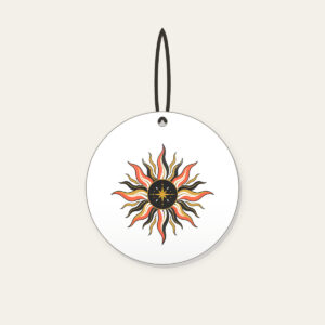 Sunburst Lines on Charcoal with a Small Star Ceramic Ornament in white: Sun lines in coral, gold and white radiate across a charcoal ground, with one small star set off to one side.