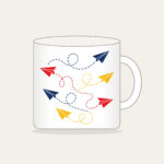 Paper Planes and Dotted Flight Paths Mug in white: Paper planes trace dotted flight paths across cream in navy, red and yellow.