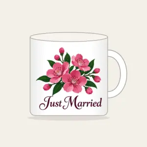 Cherry Blossoms and Just Married Wording Mug in white: A cluster of cherry blossoms in deep rose pink and dark green, with the words “Just Married” in dark plum below.