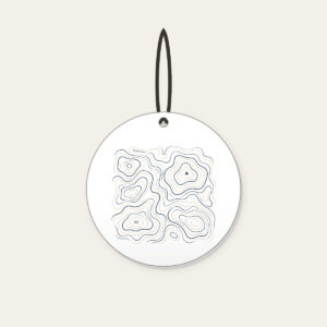 Topographic Contour Lines with a Single Peak Ceramic Ornament in white: Topographic contour lines in slate and cream with one small peak mark.
