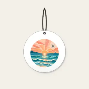 Coastal Sunrise Bands with a Compass Rose Ceramic Ornament in white: Bands of peach, coral and teal show a coastal sunrise, with tiny waves and a small compass rose.