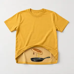Pancake Flip Tee with flat pancake-and-skillet print with three syrup drops on the inner lower front, revealed when the hem is flipped