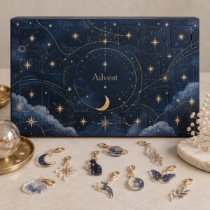 Midnight blue advent calendar box with gold constellations and acrylic charms