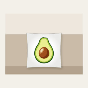 Halved Avocado Study Pillow in white: An avocado cut open in leaf green, with a warm brown pit and a pale cream highlight.