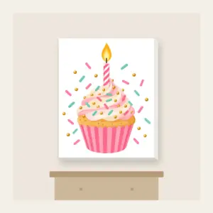 Candlelit Cupcake with Sprinkles Canvas Print in white: A cupcake with a lit candle and scattered sprinkles in pink, mint and gold.