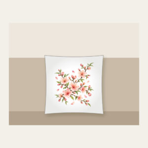 Peach Blossom Branches on Cream Pillow in white: Peach blossoms and slender branches in peach, rose and pale green rest on a glossy cream ground.