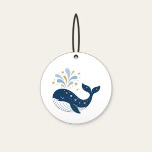 Starry Whale with Water Spout Ceramic Ornament in white: A friendly whale lifts a spout of water among tiny white and gold stars.