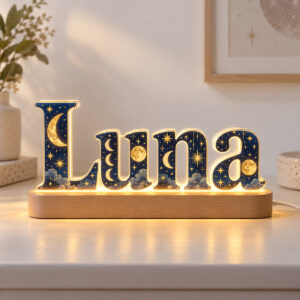 Luna acrylic letter night light with printed moon phases on a wooden LED base