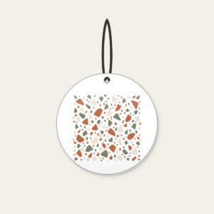 Terracotta and Sage Terrazzo Chips Ceramic Ornament in white: Terrazzo chips scattered in terracotta, sage and cream.