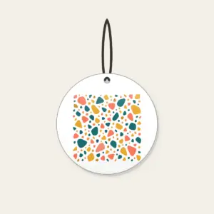 Coral, Teal and Mustard Terrazzo Pebbles Ceramic Ornament in white: All-over terrazzo pebbles in coral, teal and mustard on a cream ground with clear breathing room.