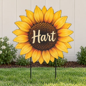 Sunflower shaped yard sign with golden petals and a name in the centre