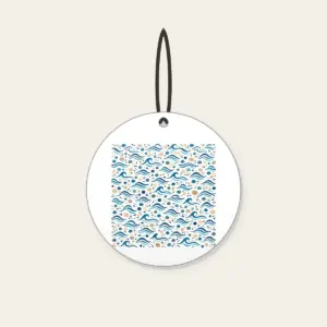 Tiny Waves and Pebbles Repeat Ceramic Ornament in white: A small-scale repeat of waves and pebbles in navy, teal and sand.