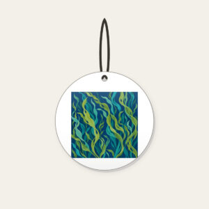 Swaying Kelp Ribbons on Deep Blue Ceramic Ornament in white: Long kelp ribbons in green and teal sway across a deep blue background.