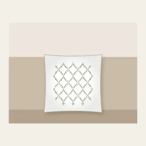 Sage Lattice Diamonds with Tiny Blossoms Pillow in white: A lattice of diamonds in sage and cream is dotted with tiny blossoms.