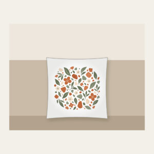 Garden Terrazzo of Leaves and Blossoms Pillow in white: An all-over terrazzo of leaves, pebbles and blossoms in terracotta, sage and cream.
