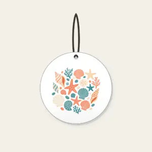 Scattered Shells and Starfish on Sand Ceramic Ornament in white: Coral, cream and teal shells and starfish are tossed across a pale sand background.
