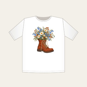Lace-Up Boot Overflowing with Daisies T-Shirt in white: A lace-up boot spilling daisies and bluebells in cream, sky blue and rust.