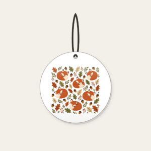 Curled Foxes, Acorns and Leaves Ceramic Ornament in white: Curled-up foxes, acorns and leaves repeat in rust, cream and moss.