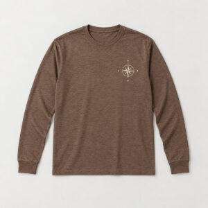 Compass Rose Long Sleeve Tee with small left-chest compass rose in cream line art with four tiny stars around it