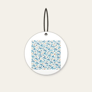 Tiny Waves and Pebbles Repeat Ceramic Ornament in white: A small-scale repeat of waves and pebbles in navy, teal and sand.