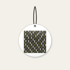 Staggered Olive Dashes on Charcoal Ceramic Ornament in white: Short olive and cream dashes in a staggered rhythm on charcoal.