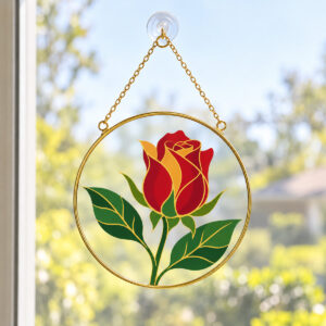 Golden Frame Rosebud Stained Glass Suncatcher with round stained-glass-style flat printed illustration of a rosebud and leaves in ruby, amber and green with a thin gold outline, UV printed on the glass