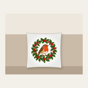 Robin in a Holly Wreath Pillow in white: A robin perches in a holly wreath in red, brown and green.