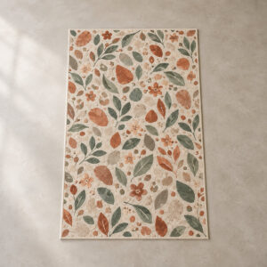 Terrazzo Garden Rug with all-over terrazzo of leaves, pebbles and blossoms in terracotta, sage and cream