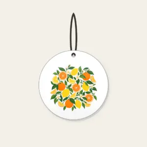 Citrus Slice Sorbet Pattern Ceramic Ornament in white: Citrus slices and leaves in orange, lemon and green spread across cream.