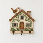 Wren House Key Holder with a small house with a wren on its roof in warm brown, cream and green