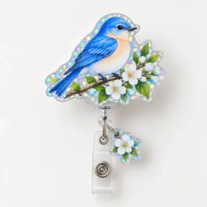 Bluebird Branch Hologram Badge Reel with a bluebird on a blossoming branch in blue, white and green