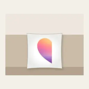 Dawn Gradient Half Heart Pillow in white: A left-half heart filled with a dawn gradient of peach, rose and pale violet, edged with a thin cream border.