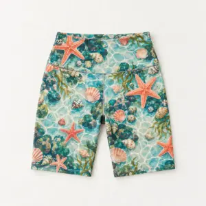 Tidepool Biker Shorts with all-over tide-pool pattern of starfish, small shells and ripples in coral and teal