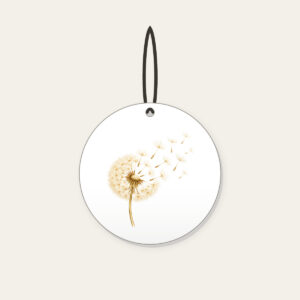 Dandelion Seeds Drifting Away Ceramic Ornament in white: A dandelion seed head with its seeds drifting away in cream and pale gold.