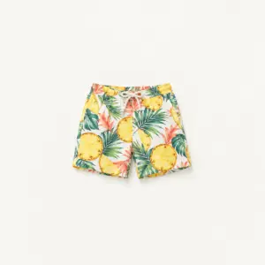 Pineapple Slice Youth Hawaiian Shorts with pineapple slices and palm leaves in yellow, green and coral on white