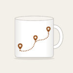 Dotted Route Linking Map Pins Mug in white: A dotted route line connects small map pins in cream on warm brown.