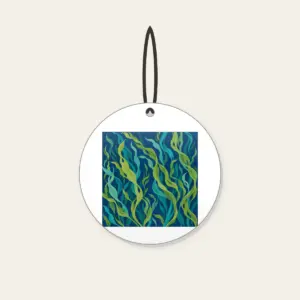 Swaying Kelp Ribbons on Deep Blue Ceramic Ornament in white: Long kelp ribbons in green and teal sway across a deep blue background.