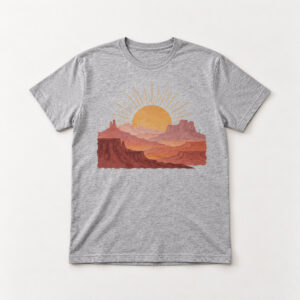 Desert Sunrise Tee with compact chest print of a sun rising over layered mesas in saffron, terracotta and dusty rose