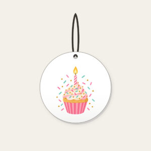 Candlelit Cupcake with Sprinkles Ceramic Ornament in white: A cupcake with a lit candle and scattered sprinkles in pink, mint and gold.