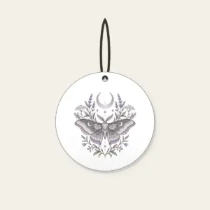 Moth and Crescent Moon with Herb Sprigs Ceramic Ornament in white: A moth beneath a crescent moon with delicate herb sprigs in silver grey and pale lilac.