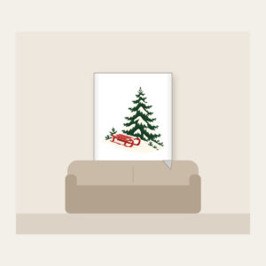 Red Sled on a Snowy Hill Fleece Blanket in white: A small red sled on a snowy hill beside a tall pine in cream, red and green.
