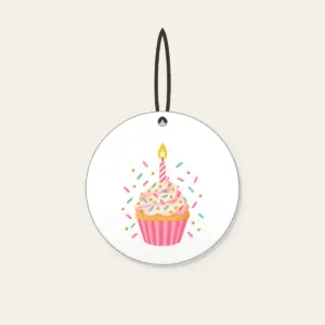 Candlelit Cupcake with Sprinkles Ceramic Ornament in white: A cupcake with a lit candle and scattered sprinkles in pink, mint and gold.