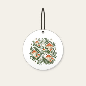 Toadstools, Ferns and Fireflies Ceramic Ornament in white: Toadstools, ferns and glowing fireflies scattered in rust and cream across a deep green forest ground.