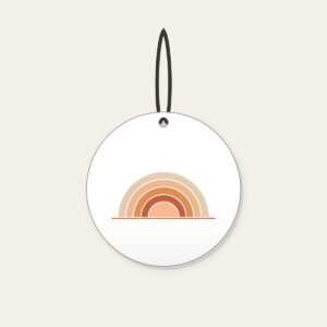 Stepped Arc Sunrise Over the Horizon Ceramic Ornament in white: A rising sun built from five stepped arcs in apricot, rust and sand above one thin horizon line.