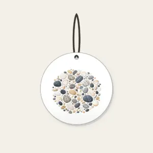 Beach Pebbles and Tiny Shells Ceramic Ornament in white: Pebbles and tiny shells in sand, slate and white are scattered across the artwork.