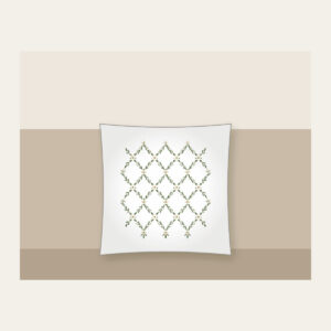 Sage Lattice Diamonds with Tiny Blossoms Pillow in white: A lattice of diamonds in sage and cream is dotted with tiny blossoms.
