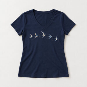 Swallow Arc Ladies' V-Neck Tee with compact chest print of five swallows flying in a gentle arc in cream and sky blue with a fine dotted trail